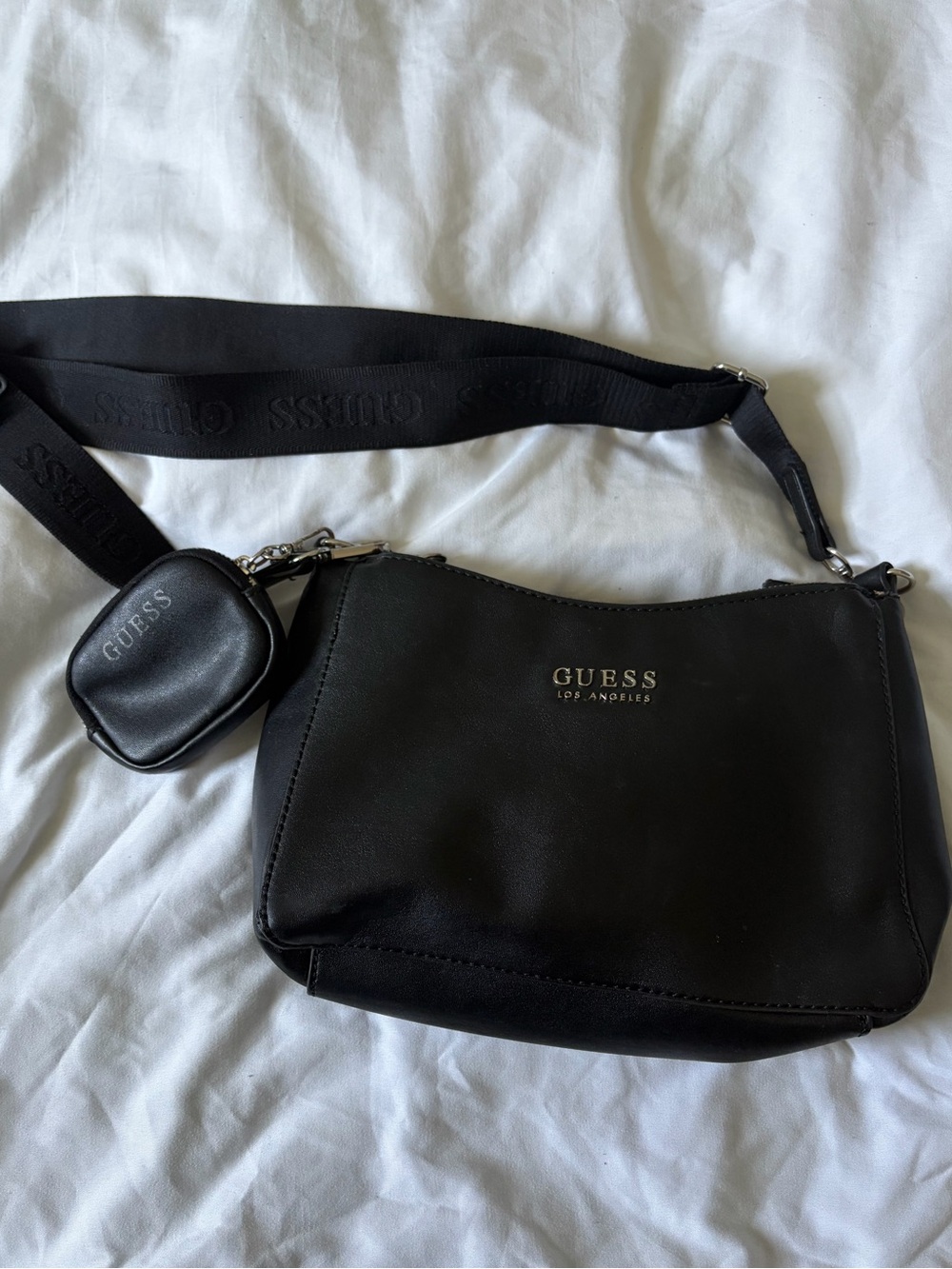 guess black bag with adjustable straps and matching coin purse